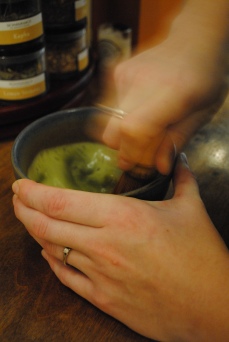 Whisk together 2 TBS matcha powder & 1 cup of hot water