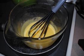 Beat egg yolks over a double-boiler for 6 minutes, add sugar, vanilla & 1 TBS matcha mixture.  Continue to beat over heat for 5 minutes or untill well blended, then remove from heat.  Beat in marscapone.