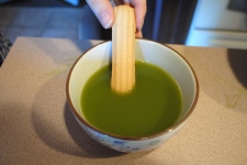 Dip lady fingers into the matcha tea mix that was made at the start, allowing each lady finger to become fully saturated.